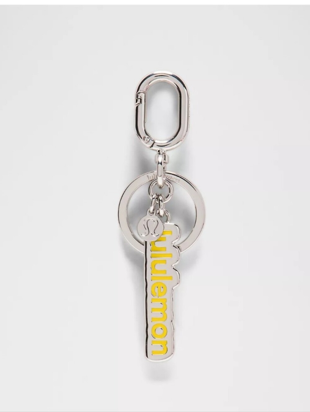 NWT lululemon athletica Silver METAL Keychain with Yellow Logo Charm